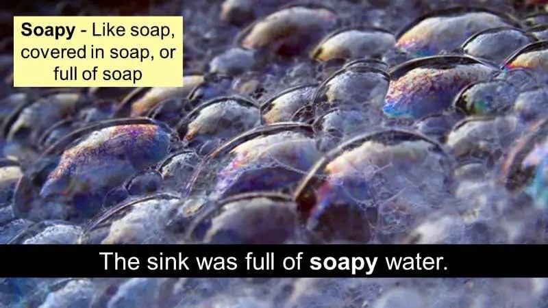 The suffix y The sink was full of soapy water.